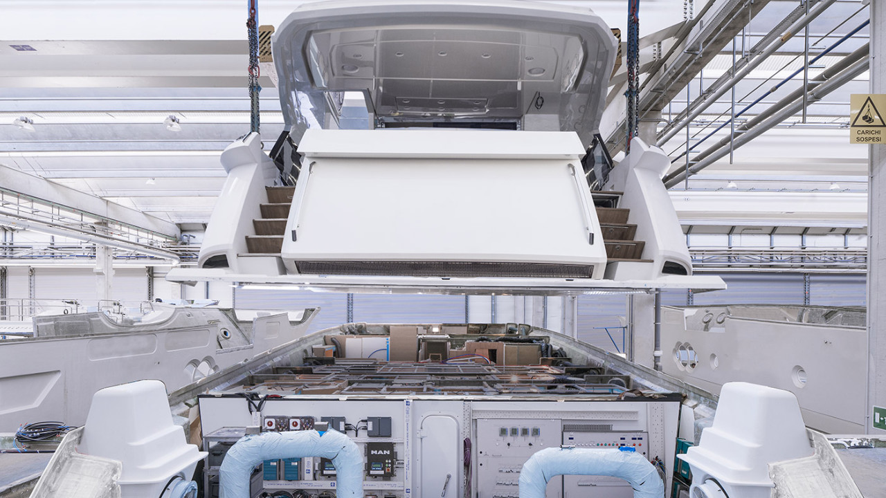 The deck is lowered into the hull in a single action.